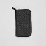 Bottega Veneta zip around wallet in nero ostrich 46333497